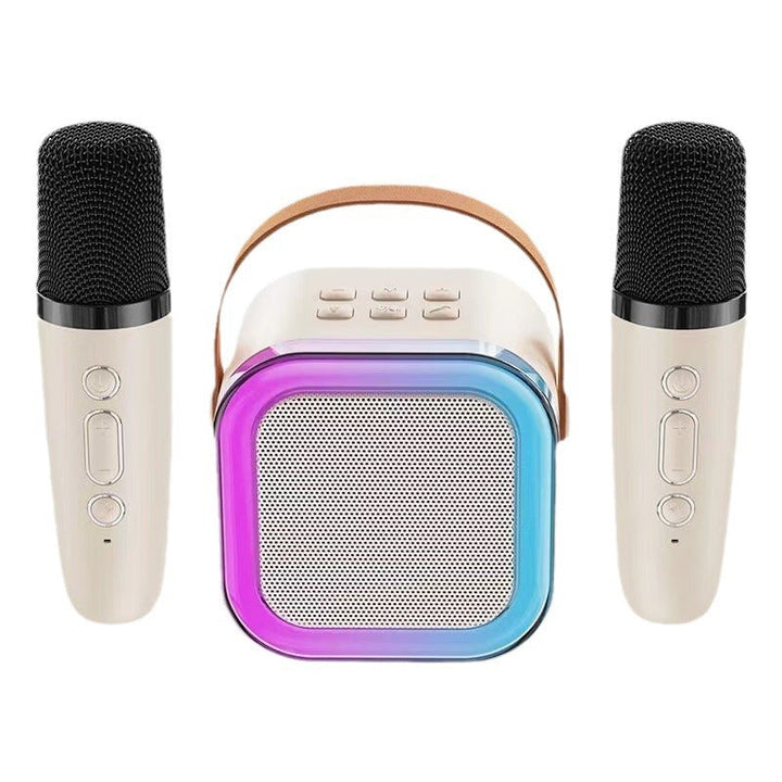 "Karaokemaskin för barn med två trådlösa mikrofoner, färgglada och bärbara, perfekt för sång och lek."