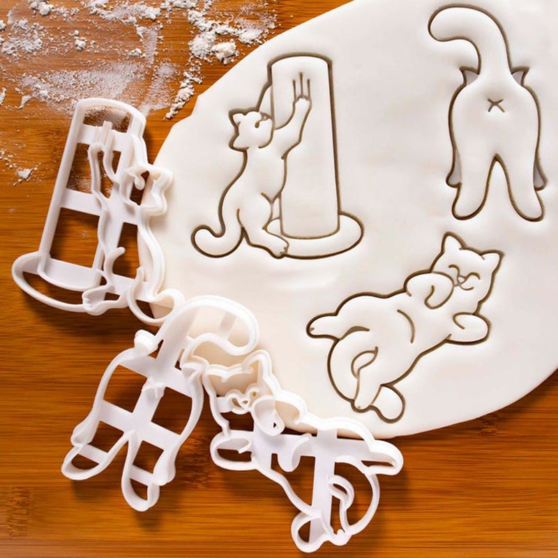 Kattformad kakskärare i vit plast för kreativ och lekfull bakning, perfekt för kakor och tårtdekorationer.
