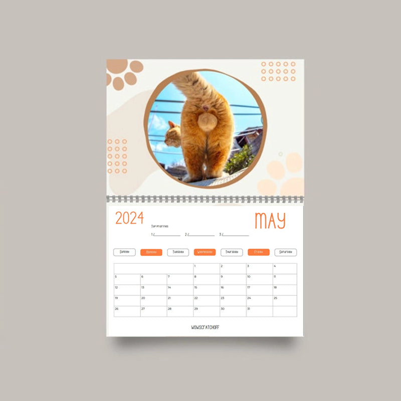 "Kattkalender 2024 med roliga kattmotiv, perfekt presentidé för kattälskare och humorentusiaster."