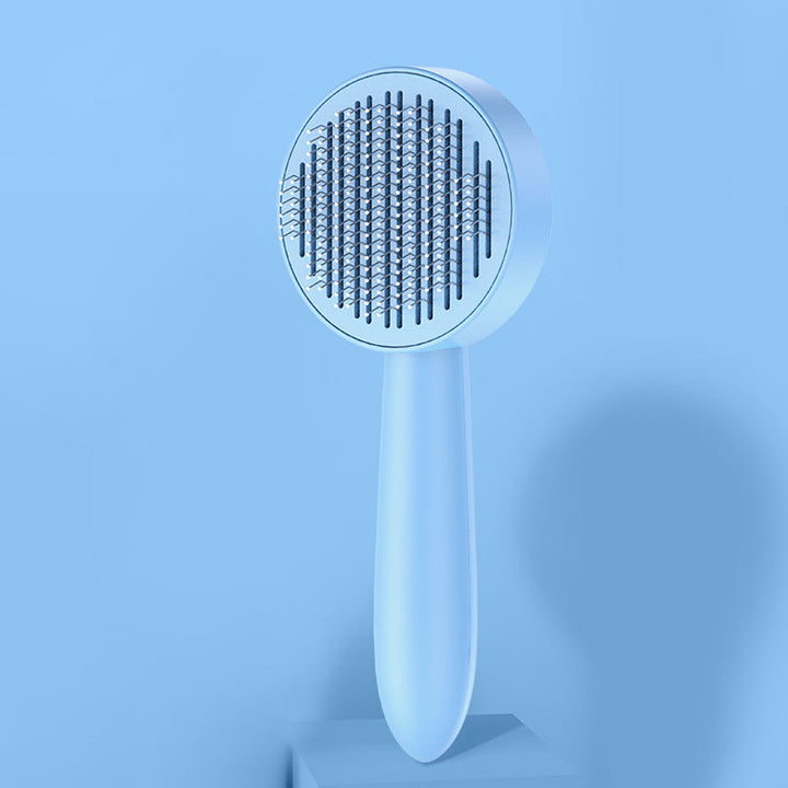 Kattvårdsborste för daglig skötsel, blå färg, ergonomisk design med rostfria stålborstpinnar för effektiv grooming.