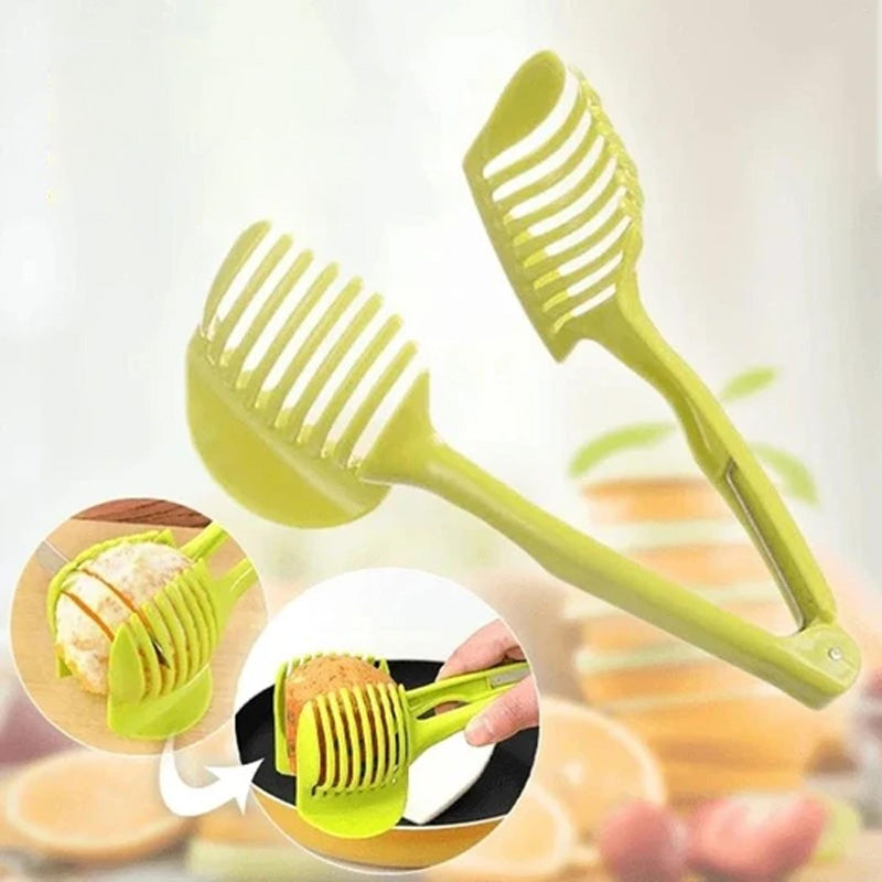 Köksverktyg för snabb slicing i grön och svart ABS-plast, med ergonomiska handtag, för säker och snabb skärning av frukt och grönsaker.
