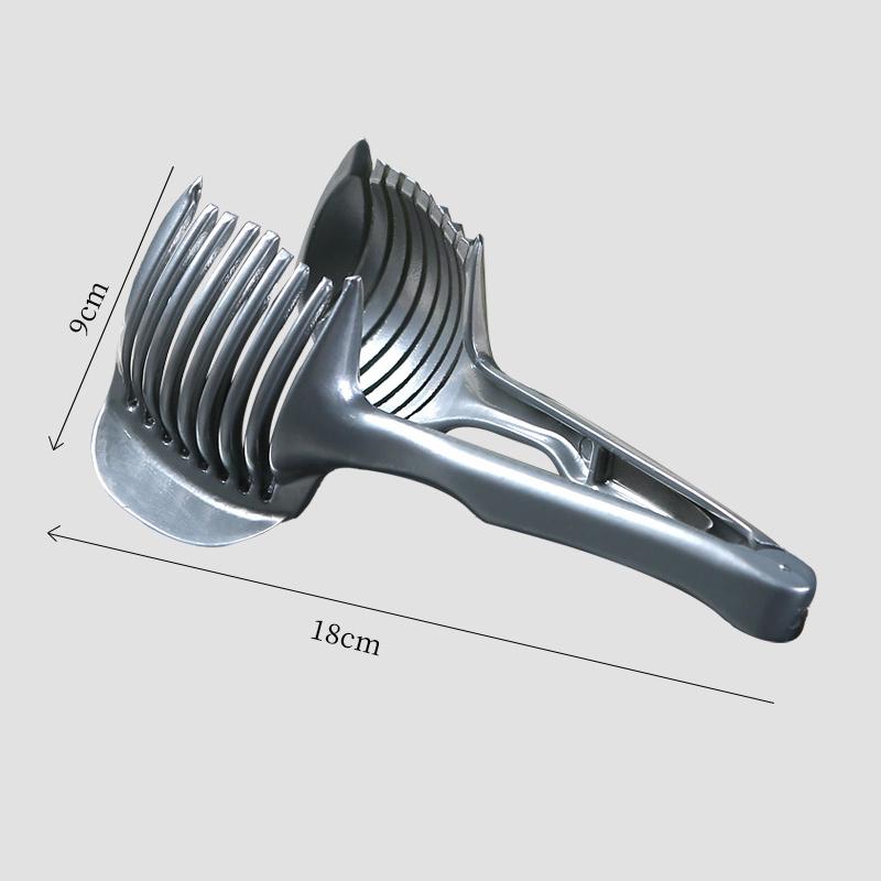 Köksverktyg för snabb slicing i grön och svart ABS-plast, med ergonomiska handtag, för säker och snabb skärning av frukt och grönsaker.