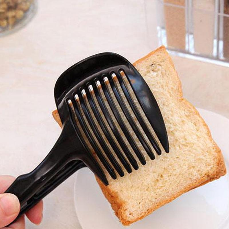 Köksverktyg för snabb slicing i grön och svart ABS-plast, med ergonomiska handtag, för säker och snabb skärning av frukt och grönsaker.