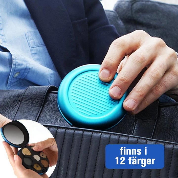 Kompakt myntdispenser i aluminium, rund form, hållbar och lätt, för smidig myntorganisation, elegant och mångfärgad.