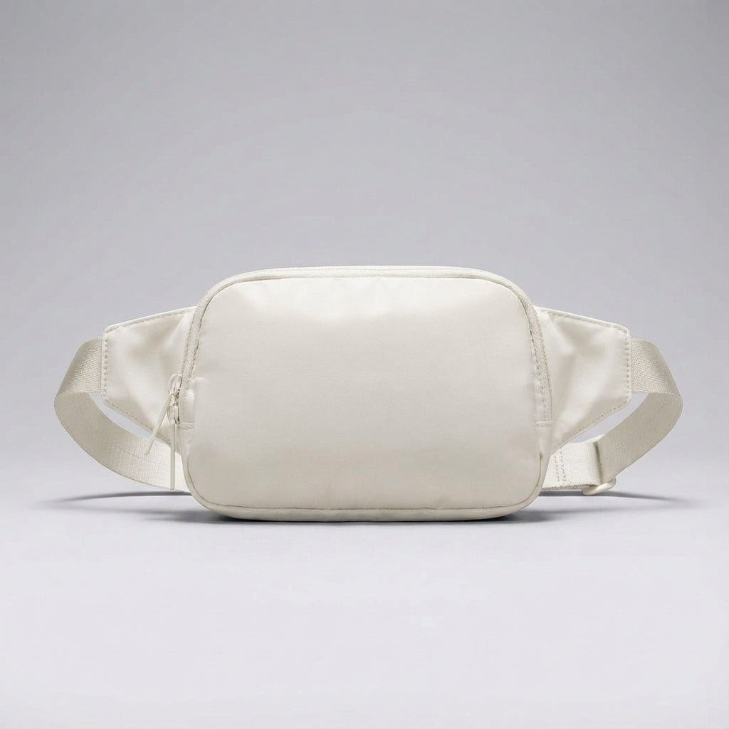 Stilren, kompakt nylon fanny pack för vardagsbruk. Håller dina tillbehör organiserade & lätta att nå.