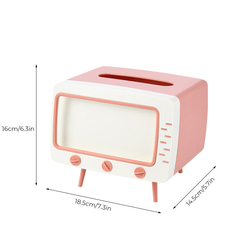 "Kreativ retro TV-servettlåda med mobilhållare i pastellfärger, nostalgi design för smart och stilren inredning."