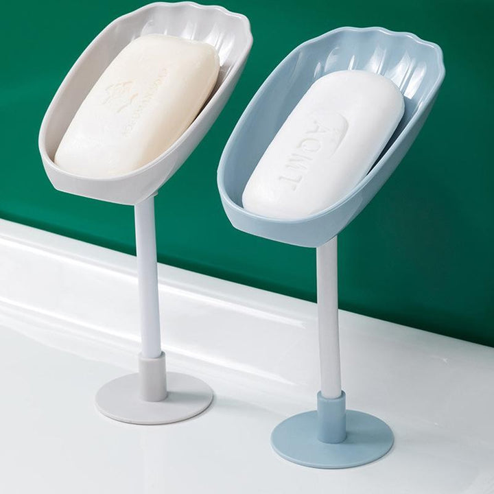 Kreativ vridbar tvålhållare i skaldesign och flera färger, justerbar för optimal dränering i badrum och kök.