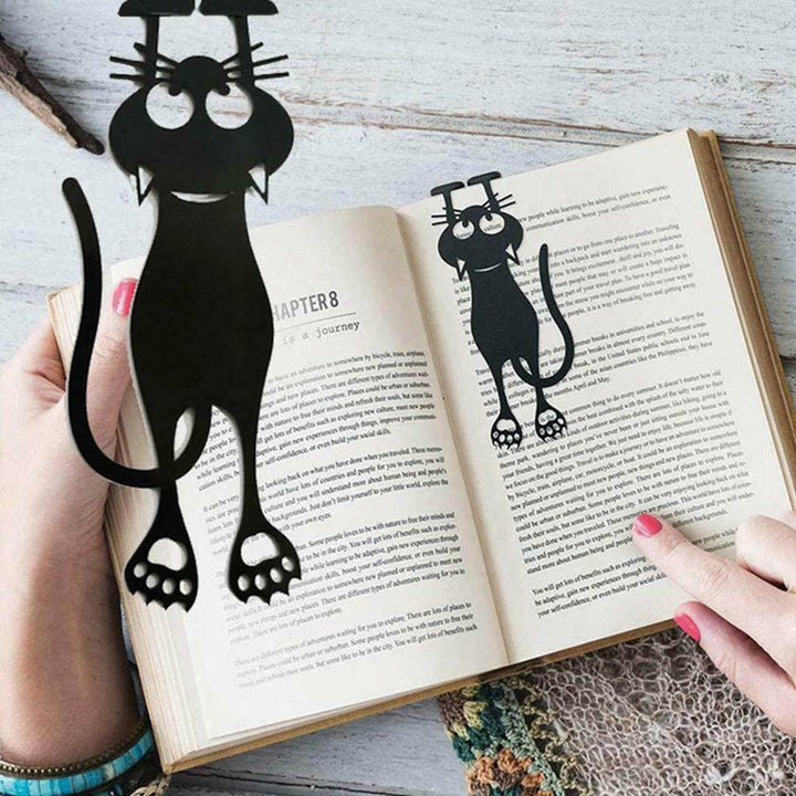 "Kreativt utklippt svart kattbokmärke i elegant siluett, perfekt för bokälskare och som present till kattälskare."