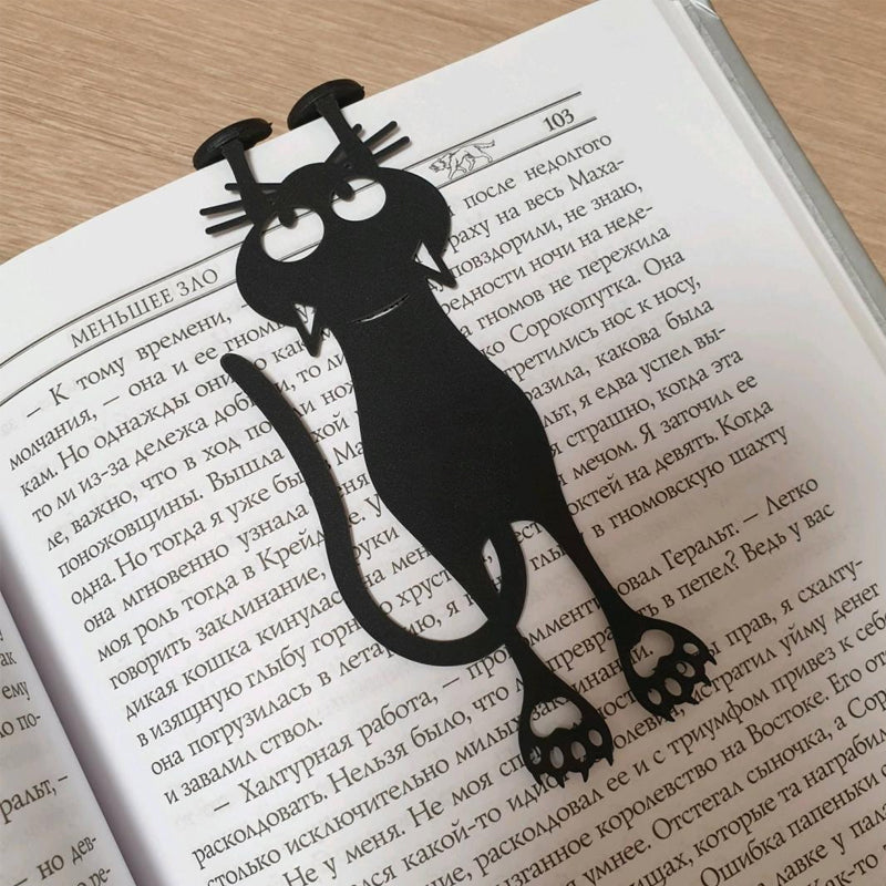 "Kreativt utklippt svart kattbokmärke i elegant siluett, perfekt för bokälskare och som present till kattälskare."