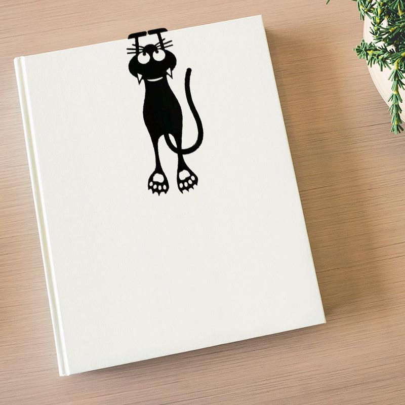 "Kreativt utklippt svart kattbokmärke i elegant siluett, perfekt för bokälskare och som present till kattälskare."