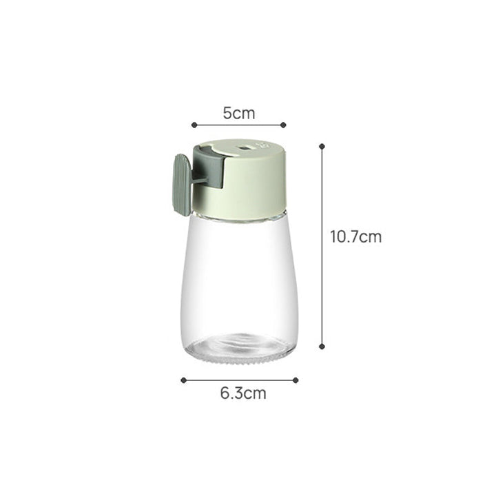 Kvantitativ kryddflaska med tryckfunktion, elegant glasdesign, exakt dosering, köksprodukt, 180 ml kapacitet.