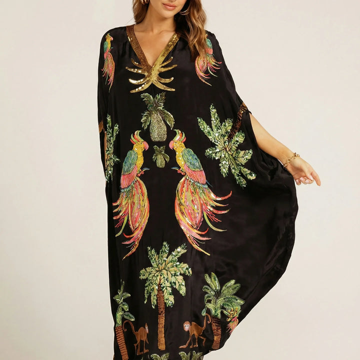 Bekväm och luftig sommarklänning. Kvinnors ankellånga kaftan med lös passform, perfekt för varma dagar.