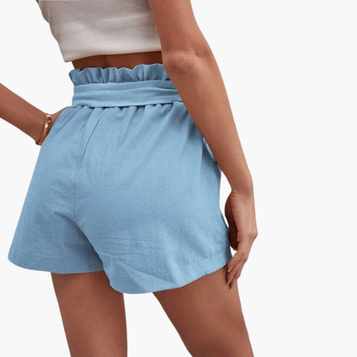 Kvinnors avslappnade shorts, med justerbart knytband & fickor, idealiska för hemmabruk.