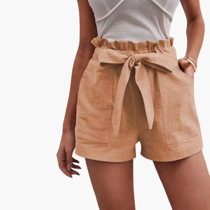 Trendiga damshorts för sommaren, med knytband & fickor, för en bekväm stil.