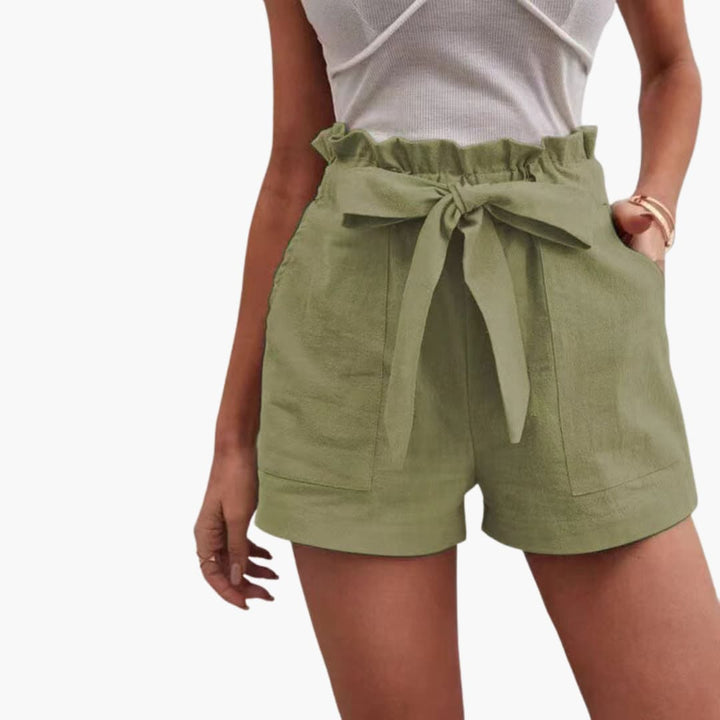 Vardagsshorts för kvinnor med justerbar midja & fickor, perfekta för varma dagar.