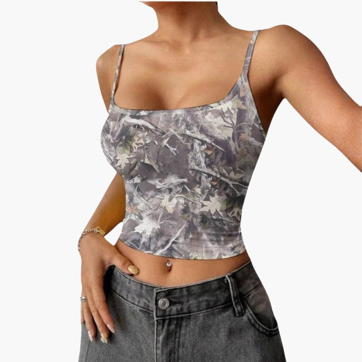Slim fit croppad topp för kvinnor med elegant fyrkantig hals. Ärmlös design och tunna axelband.