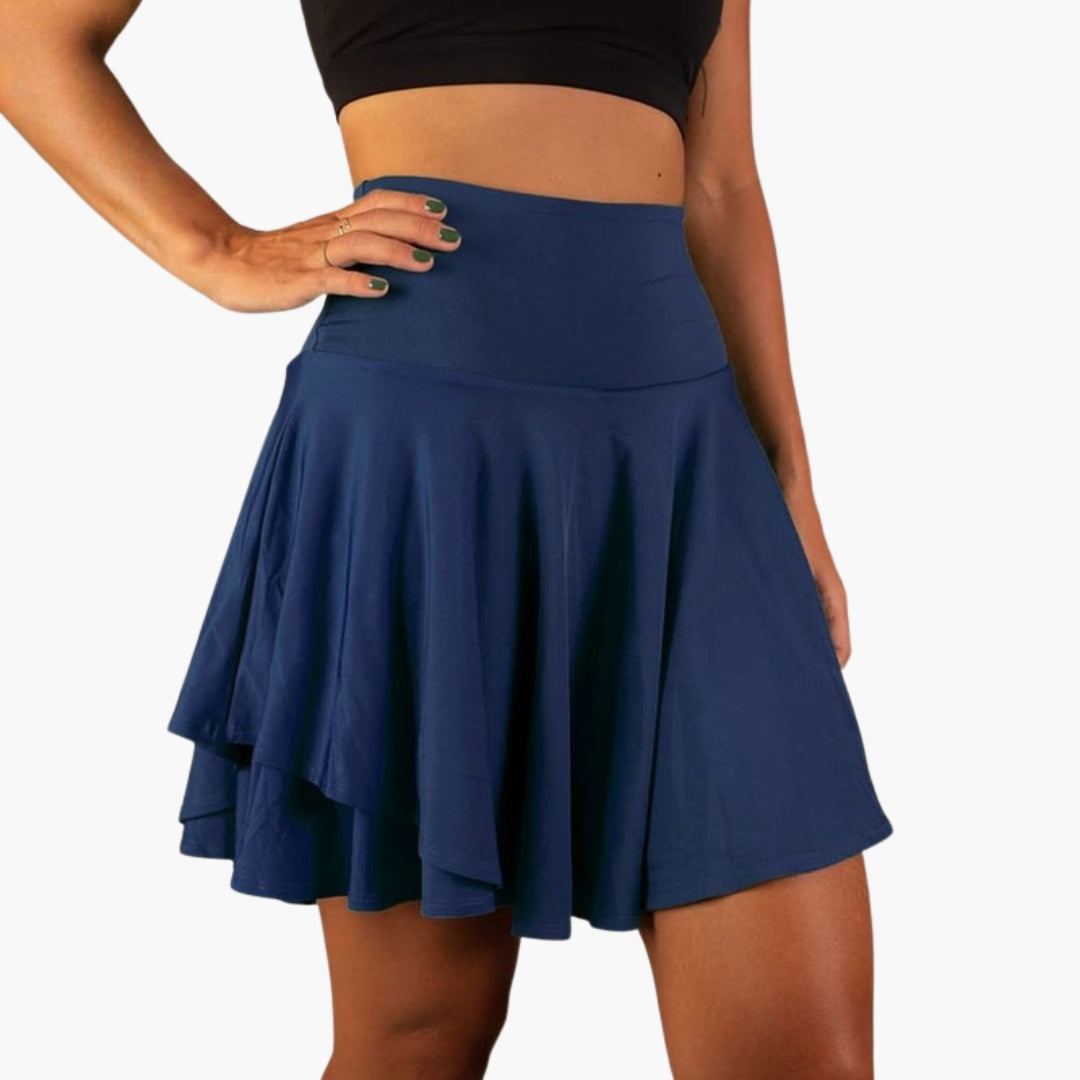 Kvinnors högmidjade sportskort med inbyggda shorts för träning, aktivkläder och fritid. Bekväm passform.