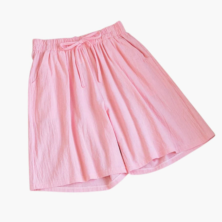 Snygga sommarshorts för kvinnor, knälånga med elastiskt midjeband. Bekväm och trendig avslappnad passform.