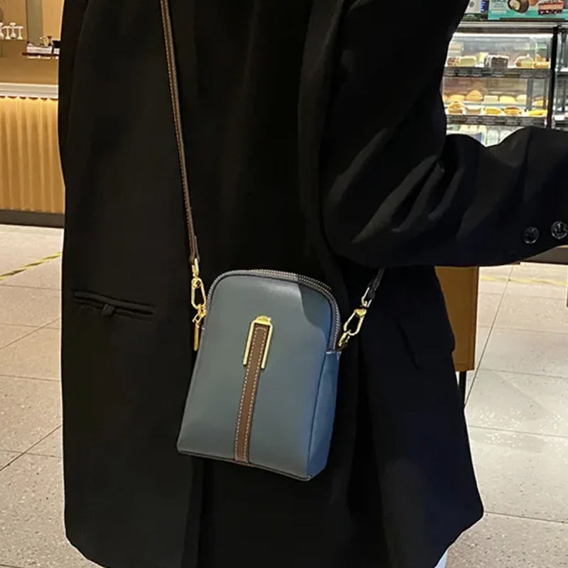 Kvinnors kurirväska i PU läder med lychee-mönster, elegant design, multifunktionell axelrem, finns i flera färger.