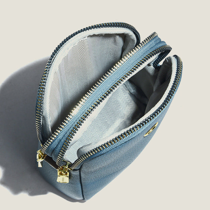Kvinnors kurirväska i PU läder med lychee-mönster, elegant design, multifunktionell axelrem, finns i flera färger.