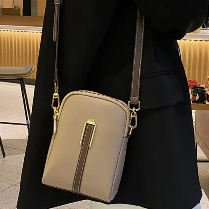 Kvinnors kurirväska i PU läder med lychee-mönster, elegant design, multifunktionell axelrem, finns i flera färger.