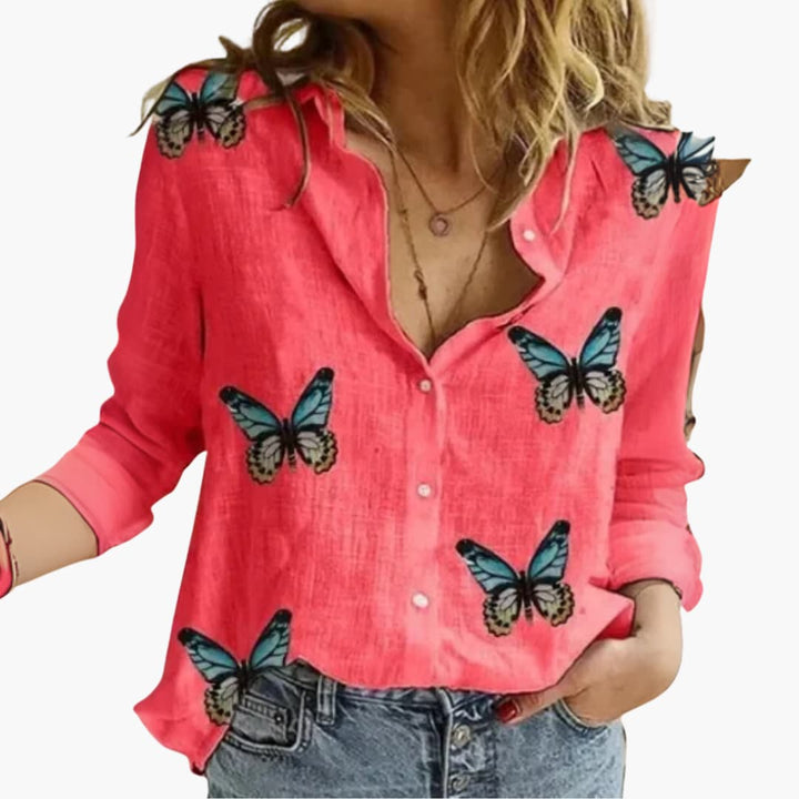 Vardagsblus: Bekväm långärmad blus med prickigt mönster. Klassisk damtopp för en stilfull look.