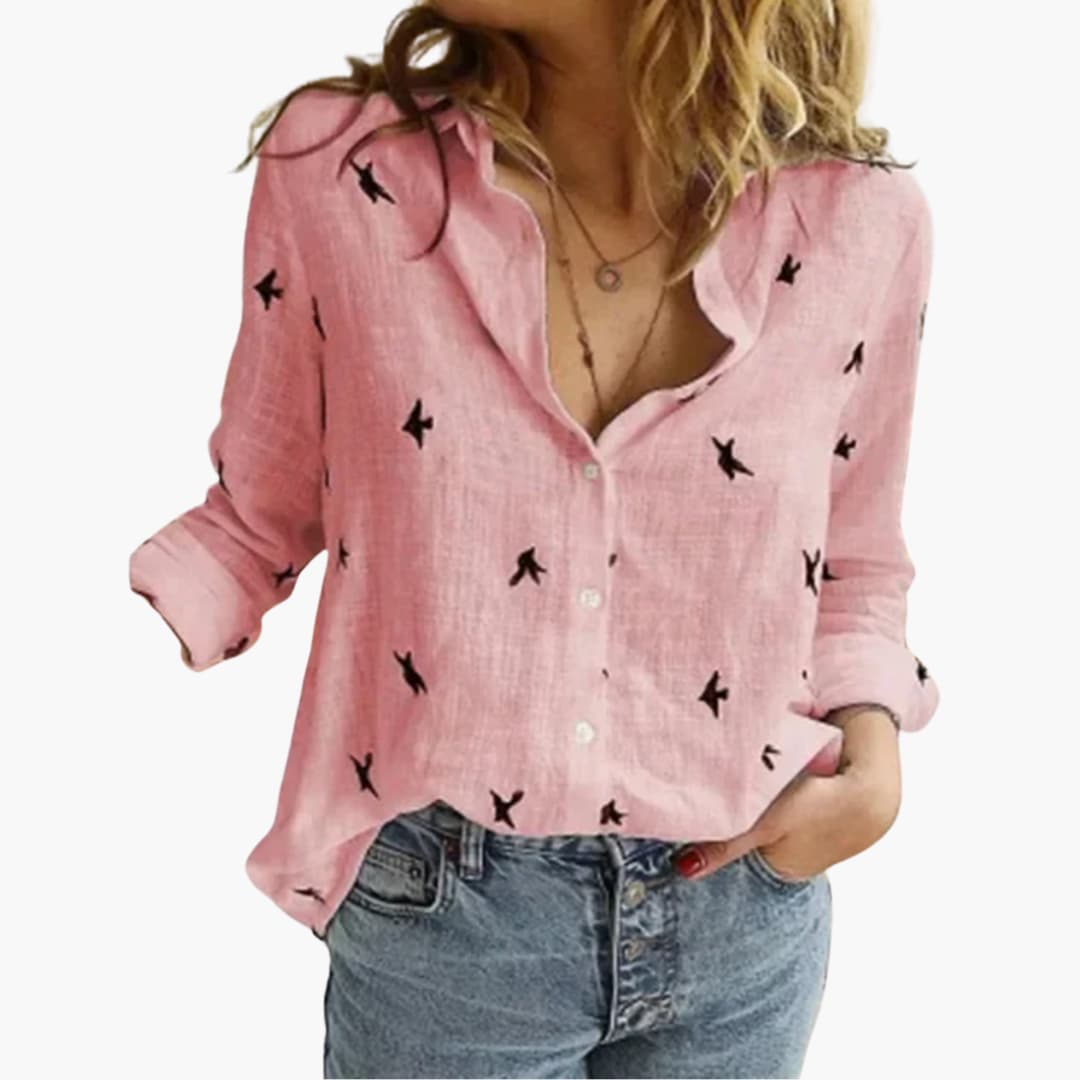 Prickig långärmad blus för kvinnor. En elegant vardags- och festblus i tidlös design.