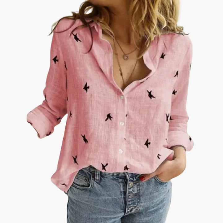 Prickig långärmad blus för kvinnor. En elegant vardags- och festblus i tidlös design.