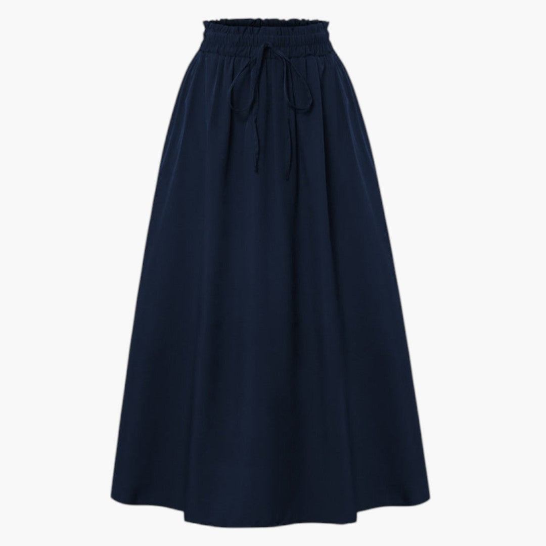 Elegant A-linje midikjol för kvinnor, mönstrad med bekväm elastisk midja. Sommarfavorit.