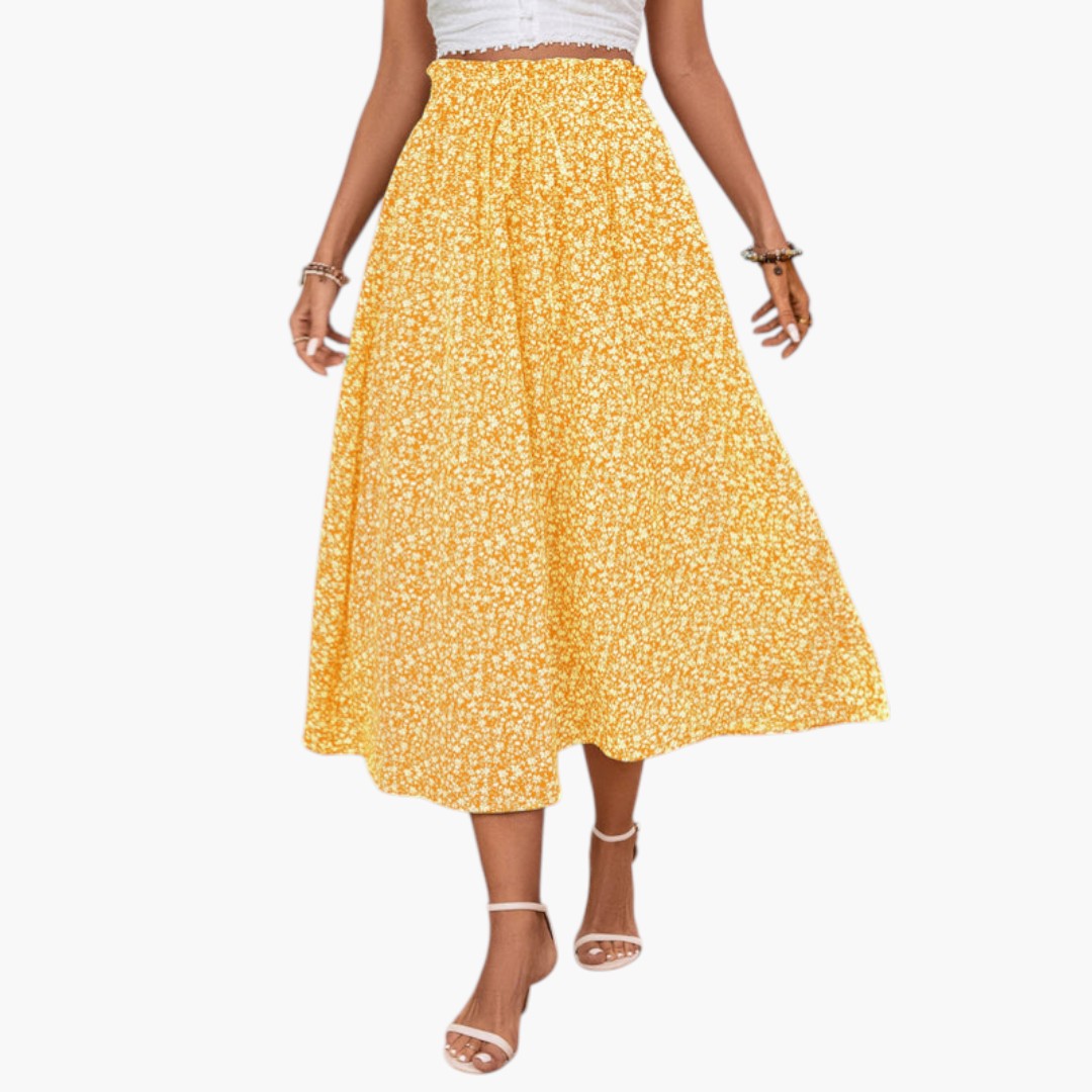 Moderiktig mönstrad midikjol för kvinnor med elastisk midja. En chic sommarstil.
