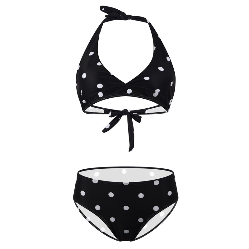 "Kvinnors sommarblommig bikiniset framifrån, livlig blommig design i blå och vit för strand och pooldagar."