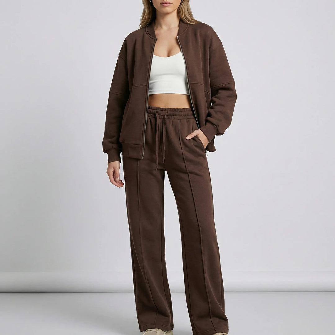 Elegant och avslappnat matchande set för damer. Topp med dragkedja, perfekt för lounge och fritid.