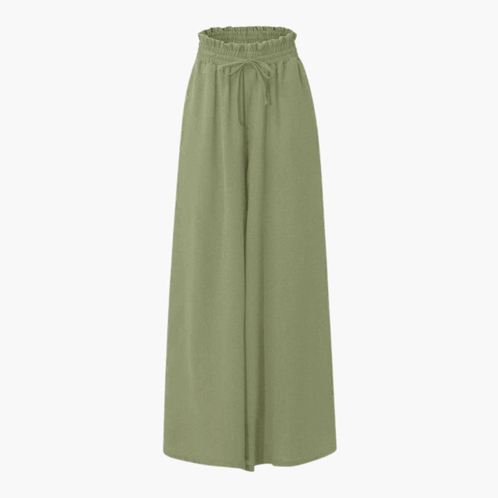 Luftiga och bekväma vida byxor för kvinnor, med elastisk dragsko. Perfekta avslappnade sommarbyxor.