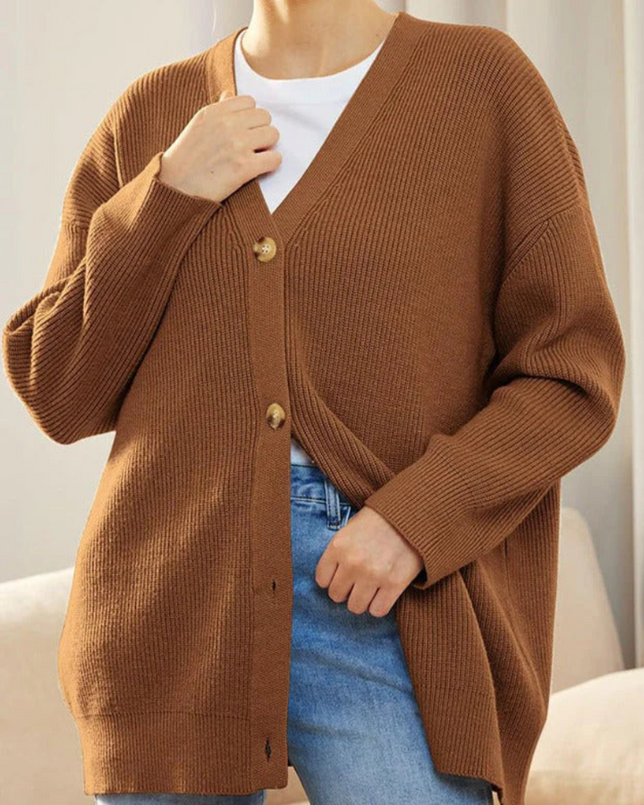 Elegant lång cardigan för dam, öppen framkant, ribbstickad design, tillgänglig i plusstorlekar.