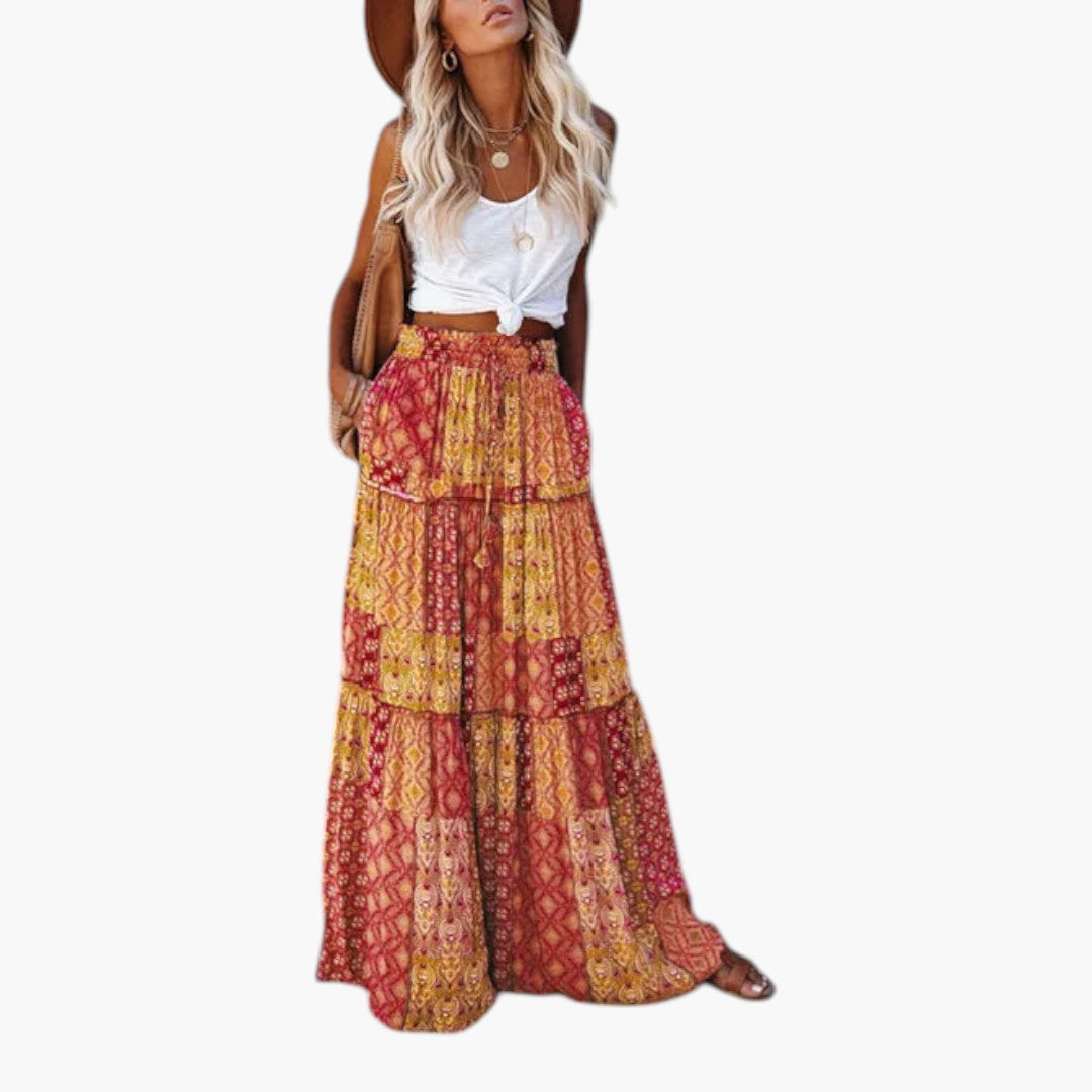 Mönstrad kvinnokjol med volanger, elastisk midja. Lång bekväm sommarkjol med lager för en flowy look.