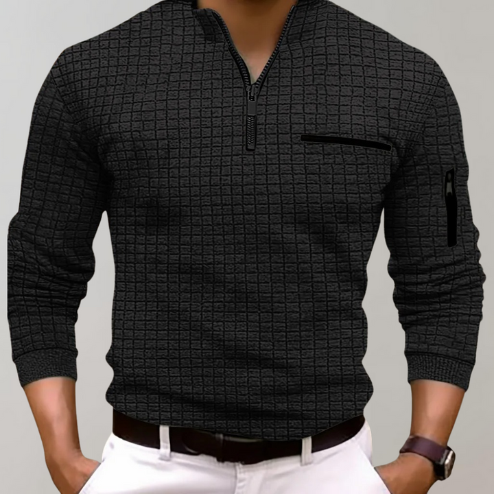 Långärmad herrpolo i klassisk stil, perfekt för vardag och höstmode. Komfortabel herrmode-topp.
