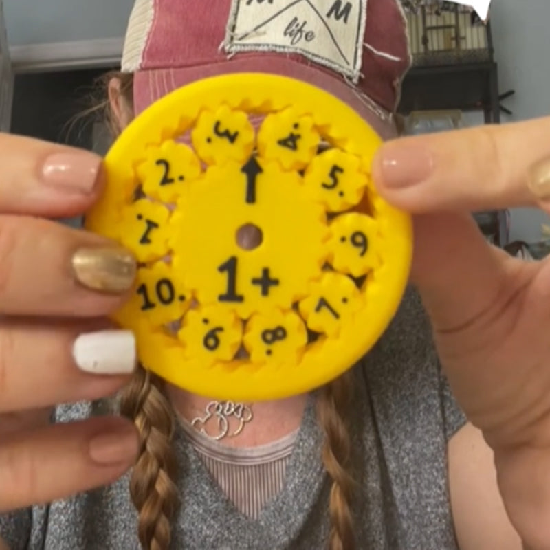 "Lärorik fidget-spinnare med färgglada detaljer för matematikträning, perfekt för barn och vuxna i interaktivt lärande."