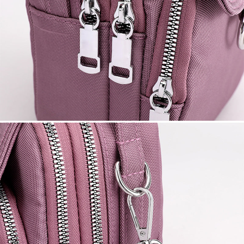 "Lätt vattentät unisex crossbody-väska i nylon med flera fickor, justerbar axelrem, kompakt och funktionell design"