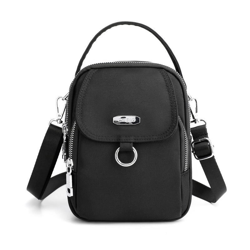 "Lätt vattentät unisex crossbody-väska i nylon med flera fickor, justerbar axelrem, kompakt och funktionell design"