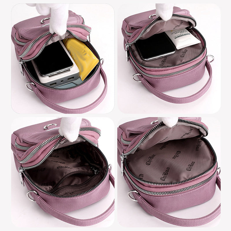 "Lätt vattentät unisex crossbody-väska i nylon med flera fickor, justerbar axelrem, kompakt och funktionell design"