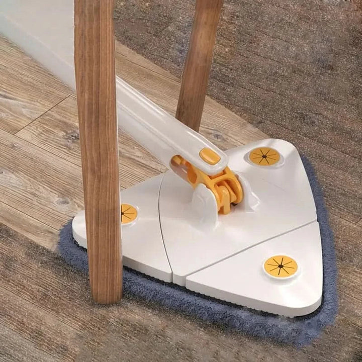 Vit 360° mopp som kommer åt trånga utrymmen vid möbler