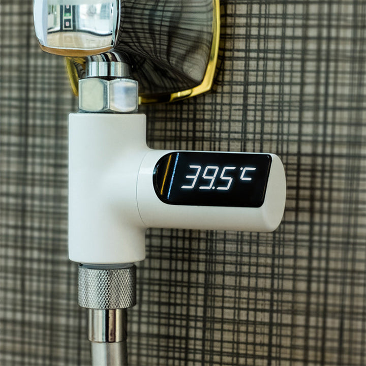 "LED-duschtermometer med 360° visning, visar vattentemperatur i realtid, färgindikator, barnsäker, ingen batteri behövs."