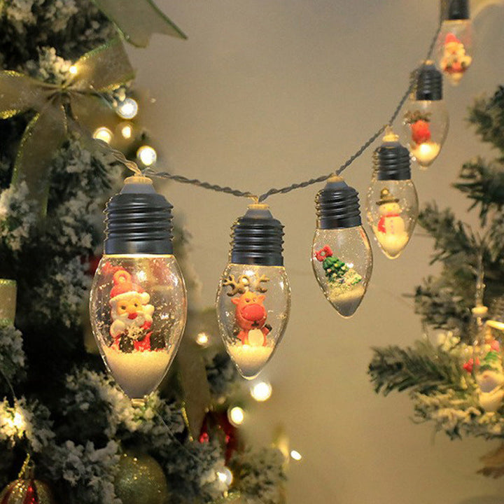 "LED-ljussträngar med julmotiv som renar och snögubbar skapar magisk stämning i hemmet."