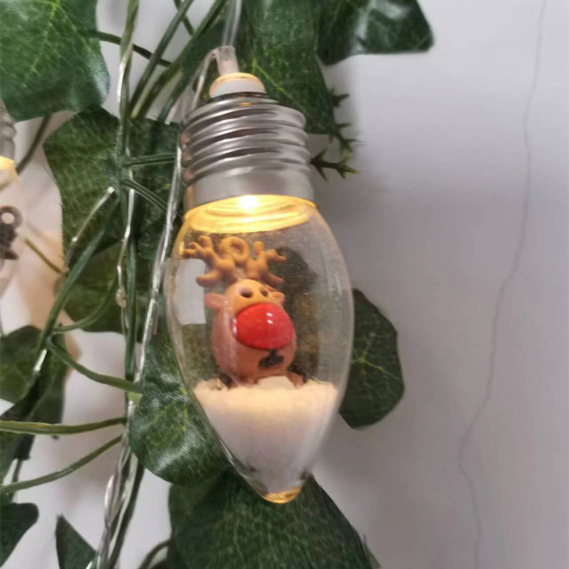 "LED-ljussträngar med julmotiv som renar och snögubbar skapar magisk stämning i hemmet."