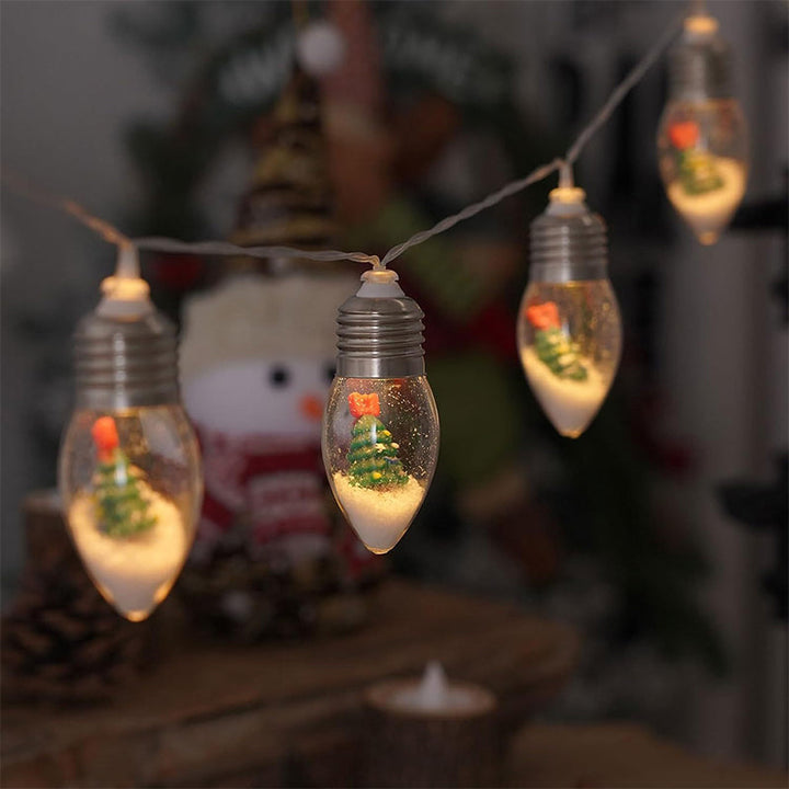 "LED-ljussträngar med julmotiv som renar och snögubbar skapar magisk stämning i hemmet."