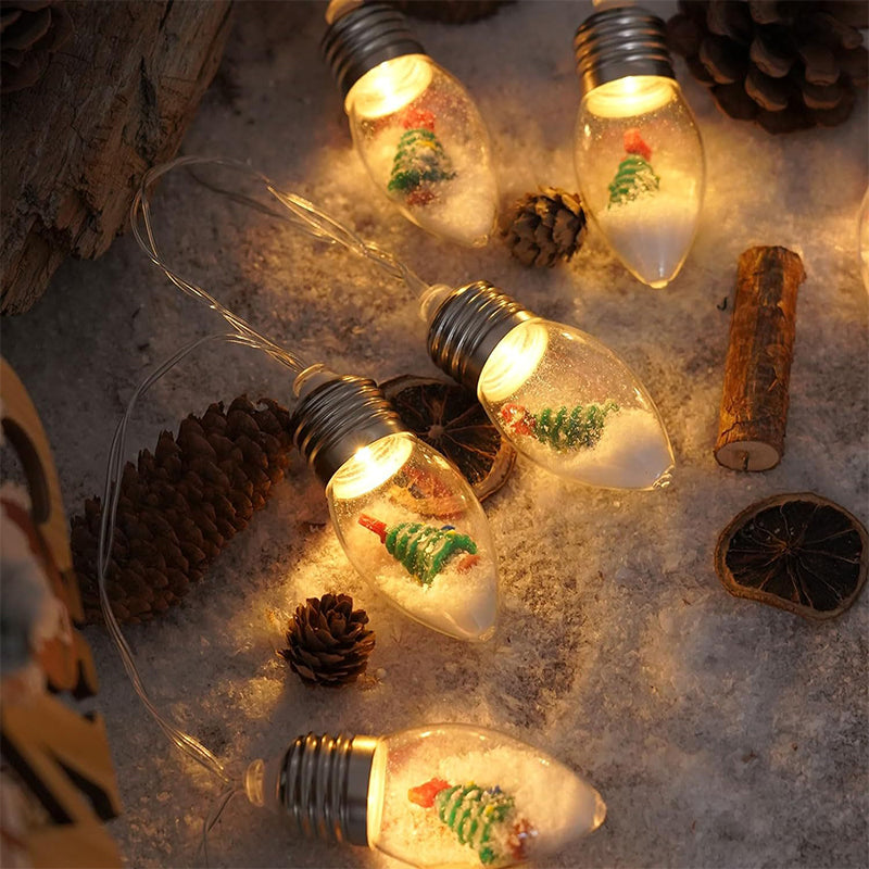 "LED-ljussträngar med julmotiv som renar och snögubbar skapar magisk stämning i hemmet."