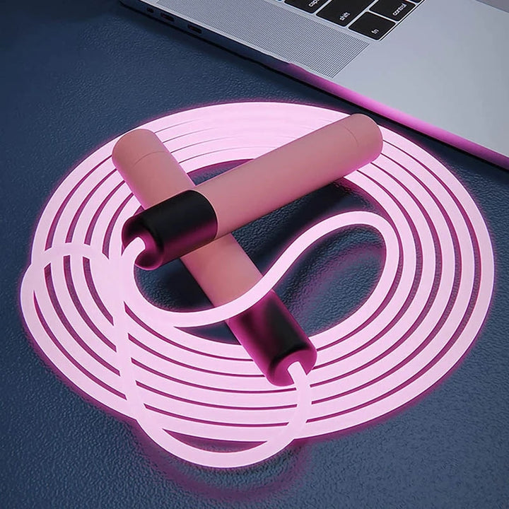 "LED-lysande hopprep med färgglada ljus och ergonomiska handtag, justerbar längd för både barn och vuxna"