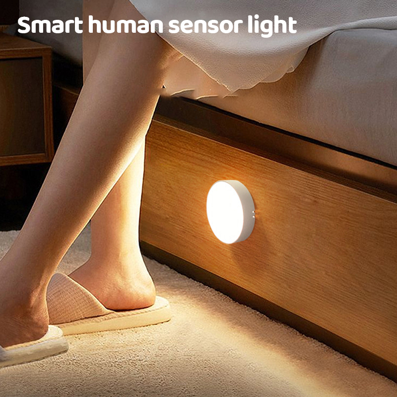 "LED smart sensorljus med rörelsedetektion och USB, vit och varm belysning i kompakt rund design, enkel installation."