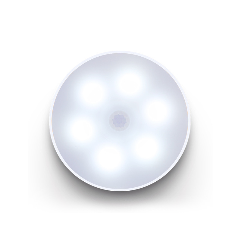 "LED smart sensorljus med rörelsedetektion och USB, vit och varm belysning i kompakt rund design, enkel installation."