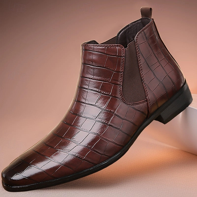 Brunt läder på herr chelsea boots med krokodilmönster från sidan